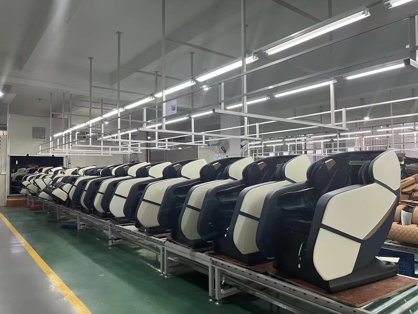 Molink Tech factory assembly line with beige and navy chairs