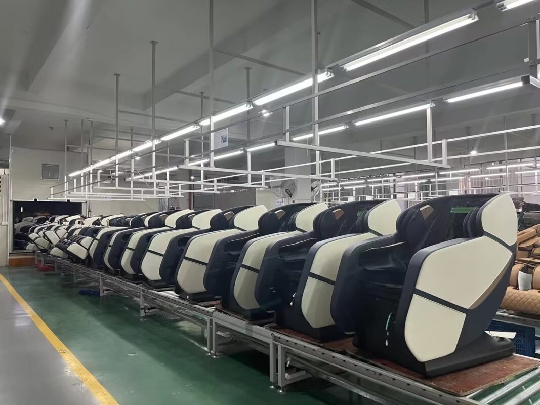 Molink massage chair factory assembly line with beige and navy chairs